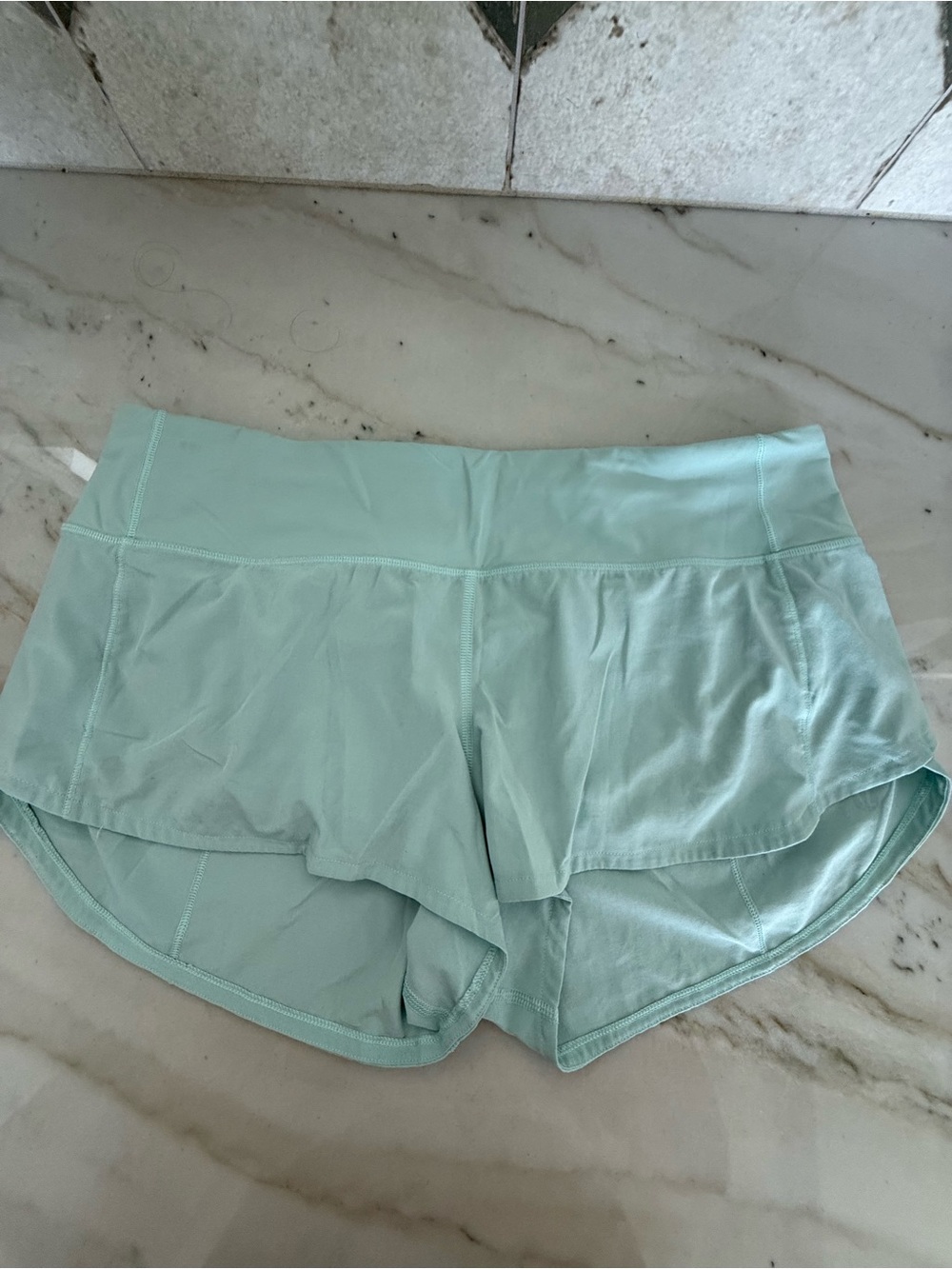 Lululemon Speed Up shorts. Mint colored. Size 8